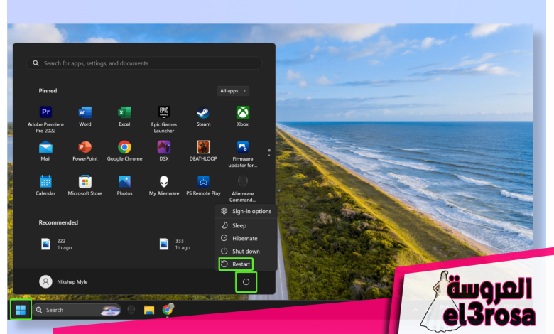 لقطة شاشة لسطح مكتب Windows توضح كيفية إعادة تشغيل الكمبيوتر.